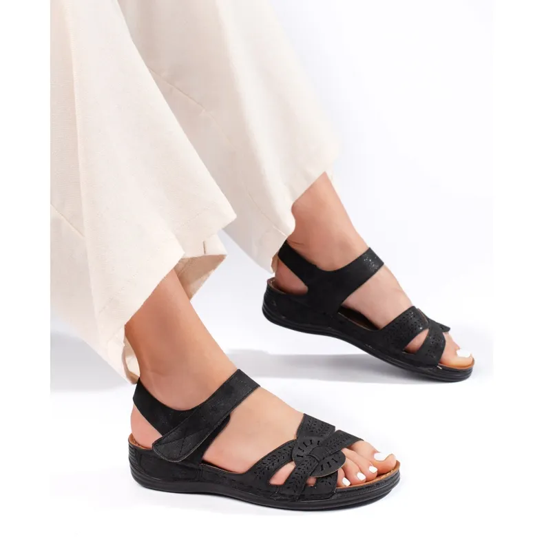 Light blue women's sandals with a low wedge